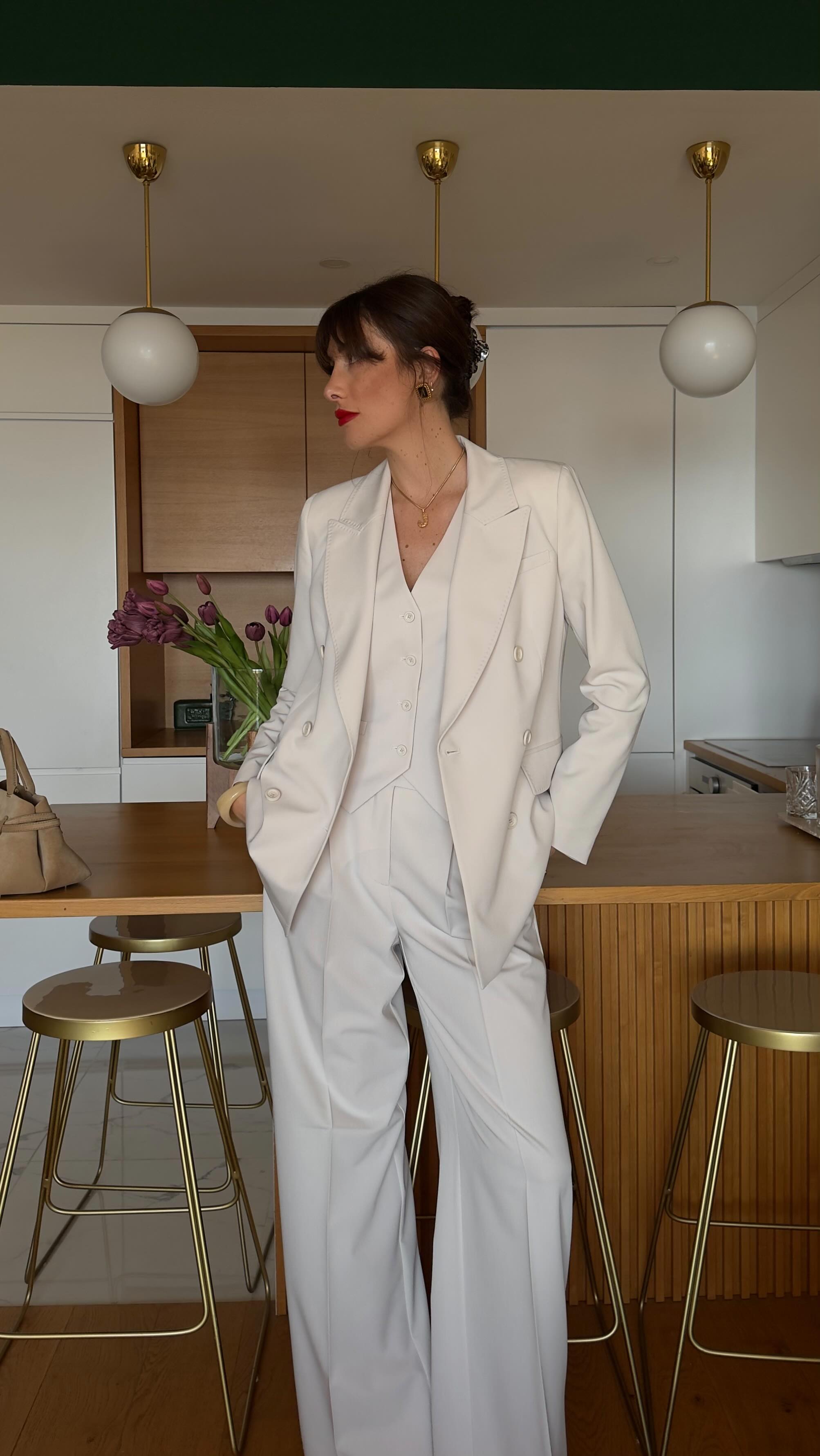 Instagram post by @juliesfi for Herno. Caption reads: The perfect everyday look by @herno_official 
The....