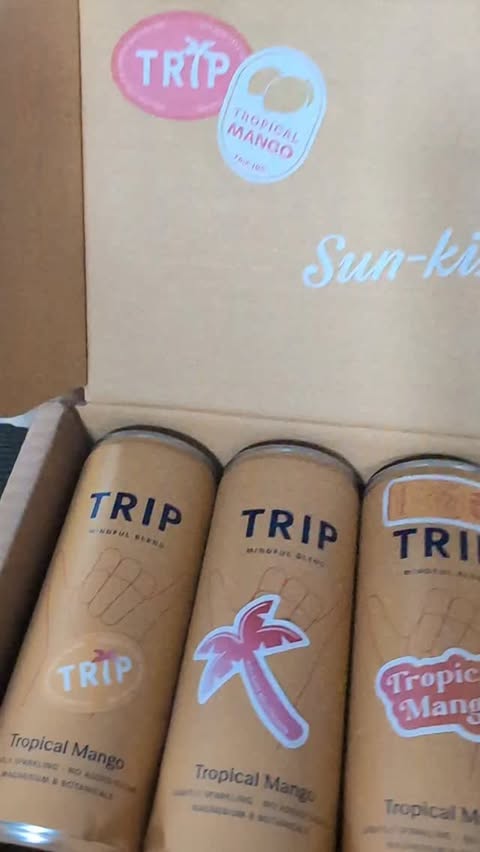 Instagram post by @nicolalemmon for TRIP. Caption reads: Ad the new tropical mango @trip.drinks are so....