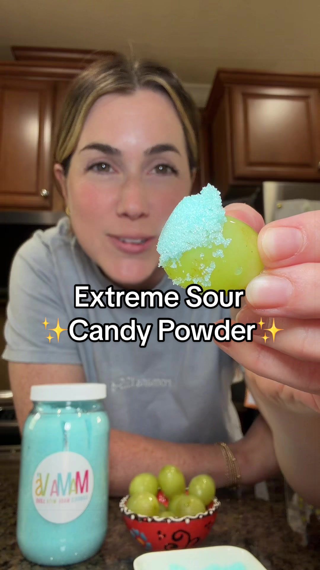 TikTok post by @jennah.samples for Mama V’s Candy. Caption reads: Trying Extreme Sour Candy Powder by @Mama Vs....