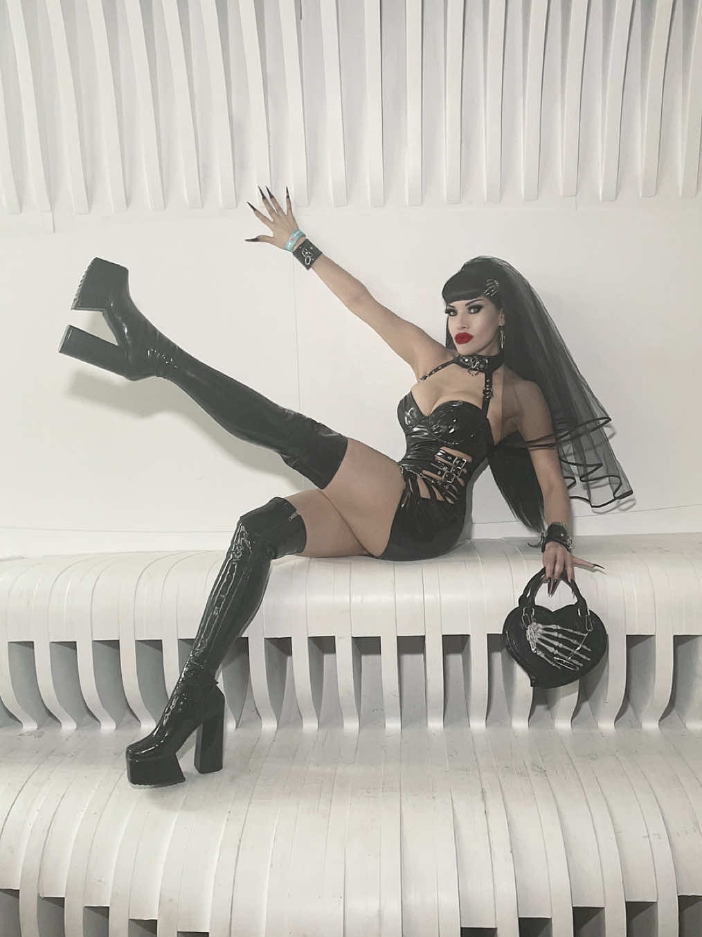 TikTok post by @victoriaveninofficial for Dolls Kill. Caption reads: [...] 1 ⛓️‍💥🦇⛓️‍💥 Styled by @Dolls Kill 💀💋....
