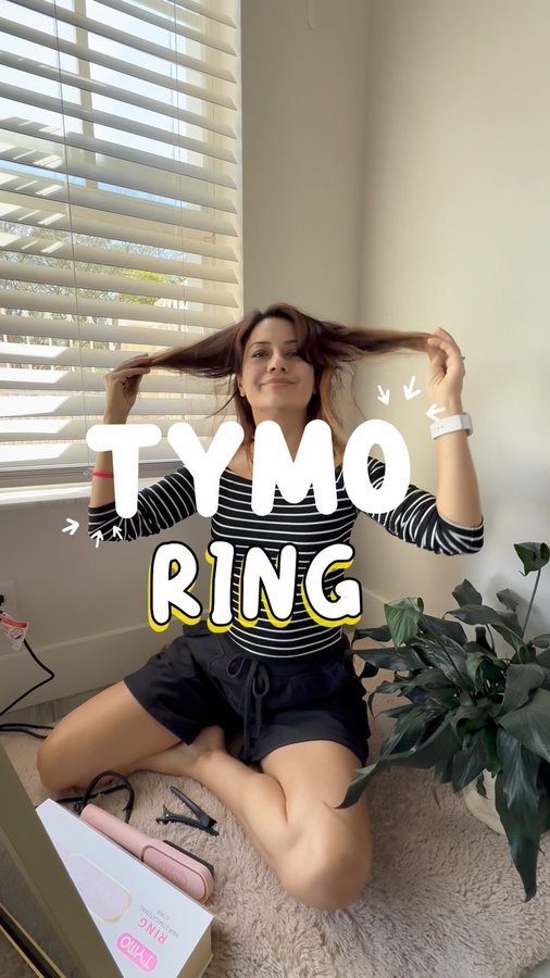 Instagram post by an influencer for TYMO BEAUTY. Caption reads: [...] #tymostraightenercomb #tymobeauty #hairdo....