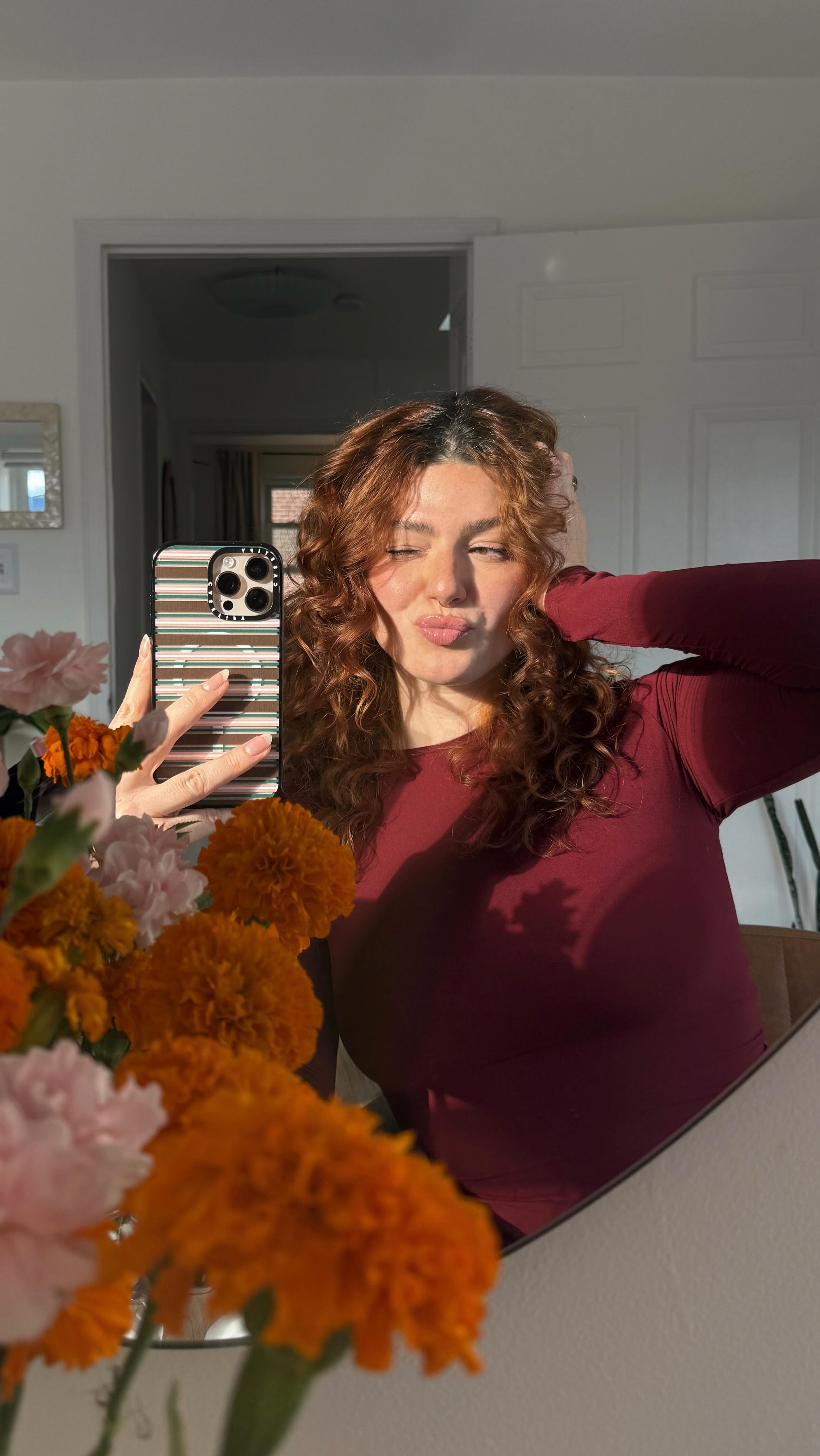 Instagram post by @brittminetti for CURLSMITH. Caption reads: [...] girl tool for curly girls 🤭 ad

the....