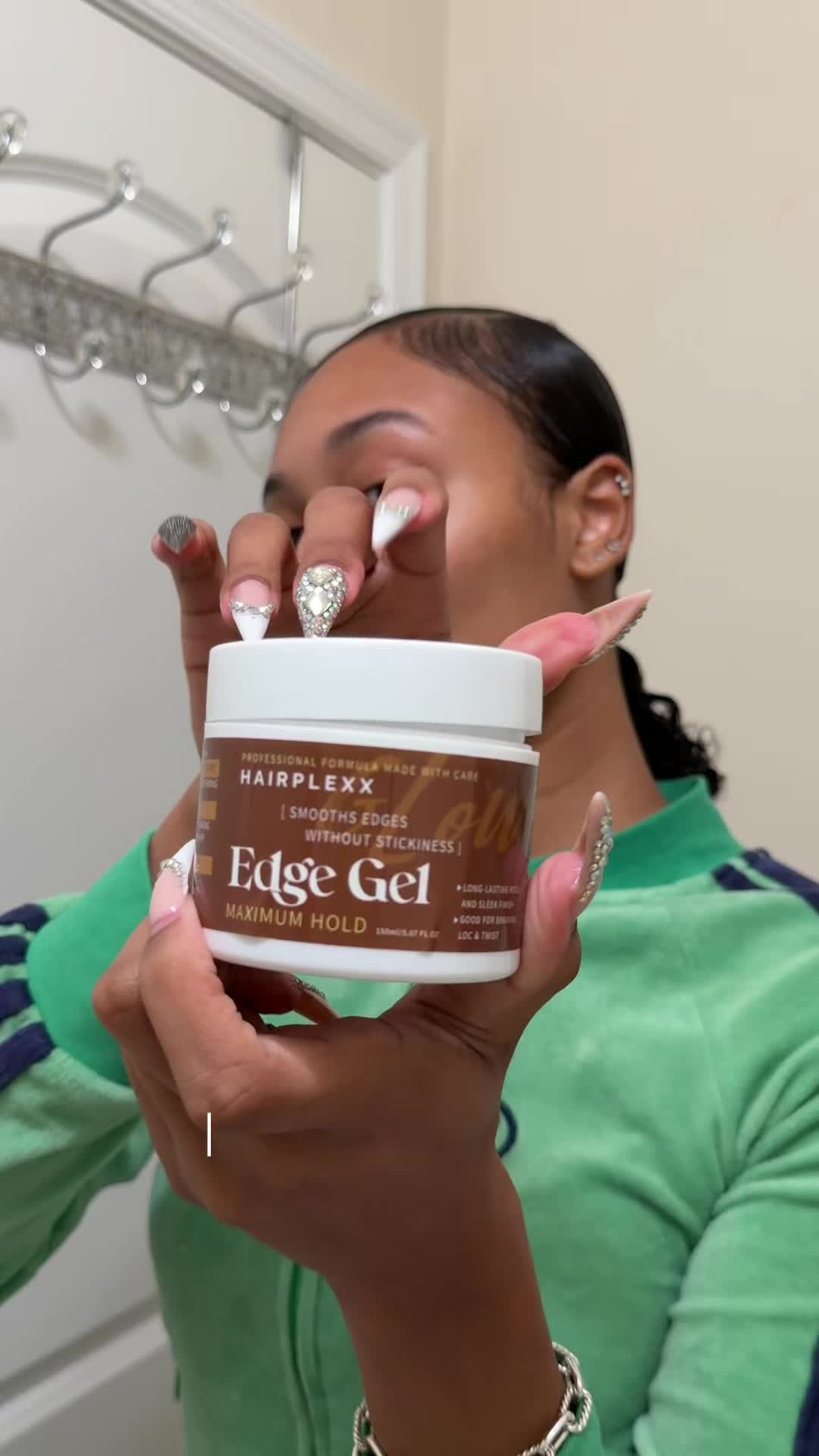 TikTok post by @iiamlael for Hairplexx Beauty. Caption reads: You NEED this edge control 😮‍💨 @Hairplexx Beauty....