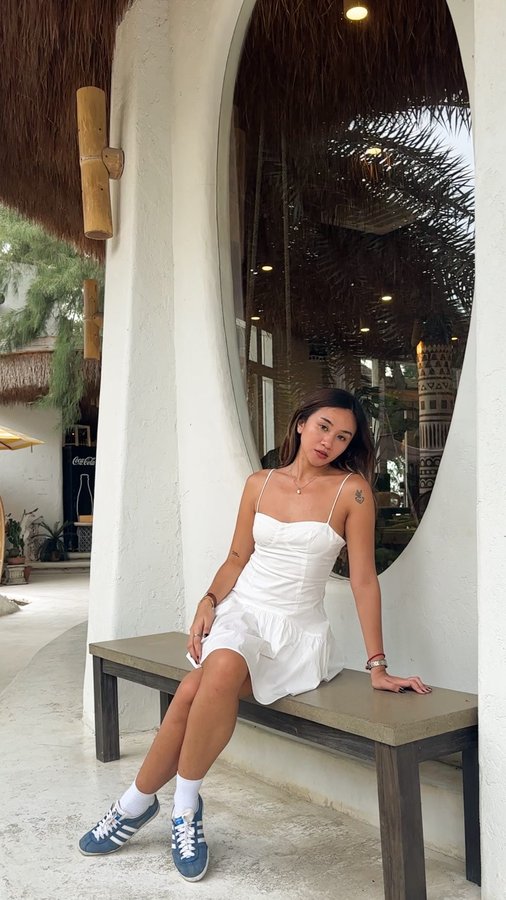 Instagram post by @ynnsnchz for ShopBack. Caption reads: Girl math when traveling? Balance something cheap....