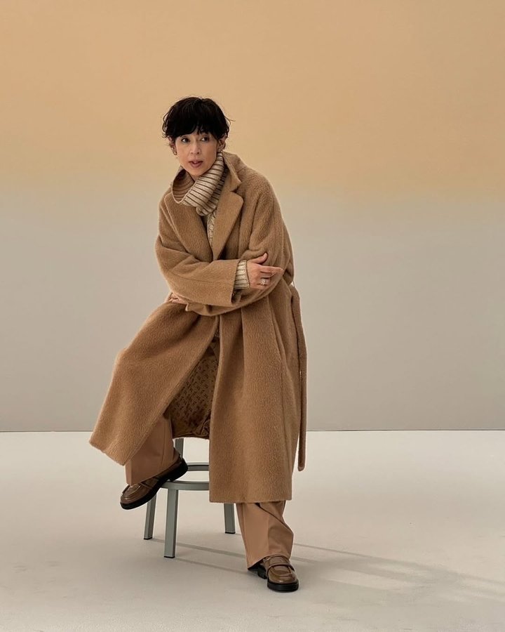 Instagram post by @honamisuzukiofficial for Herno. Caption reads: Precious 12月号　for @herno_official.