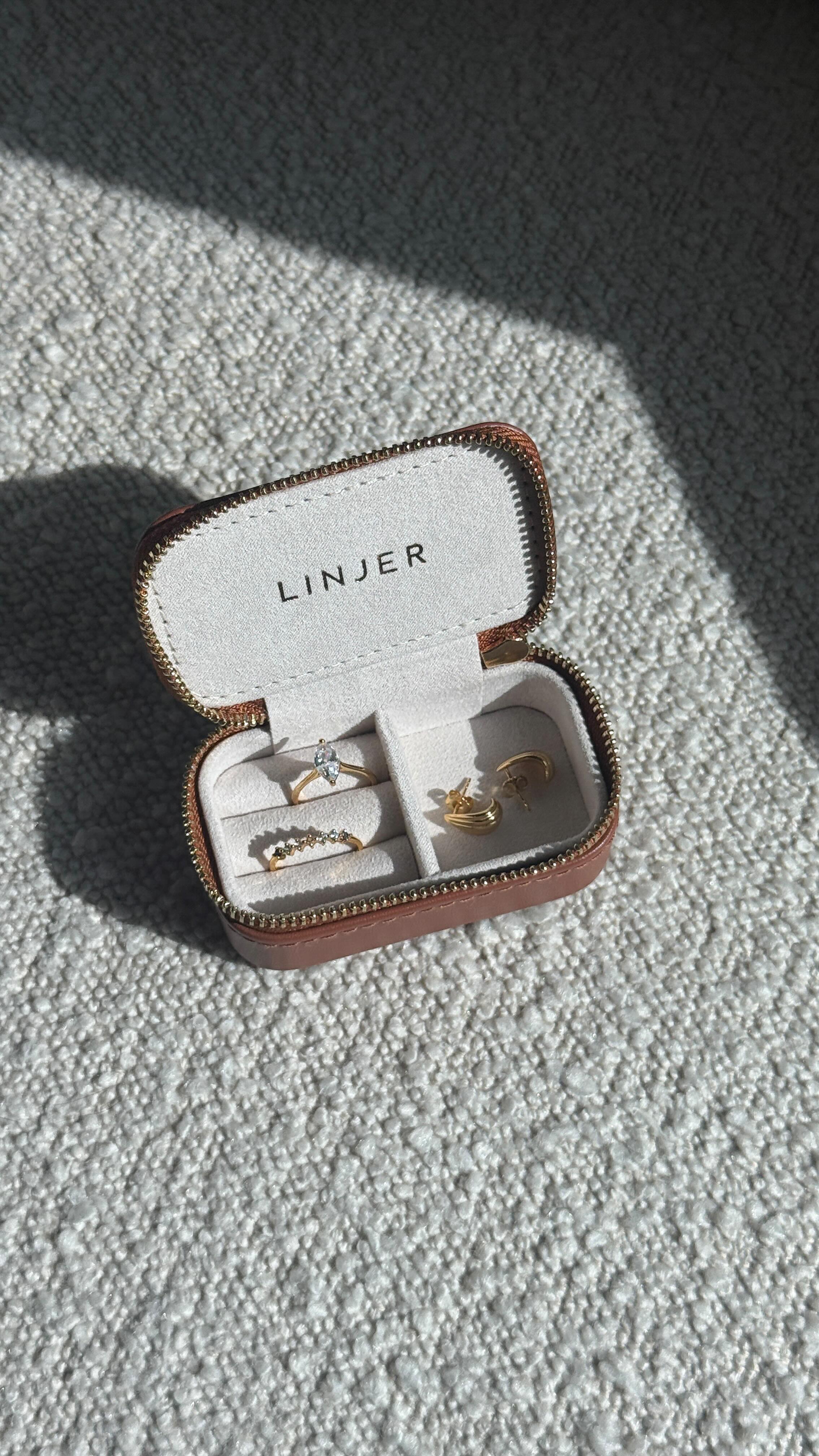 Instagram post by @bykarlacelis for Linjer Jewelry. Caption reads: Anniversary Sale @linjerco is the best time to....