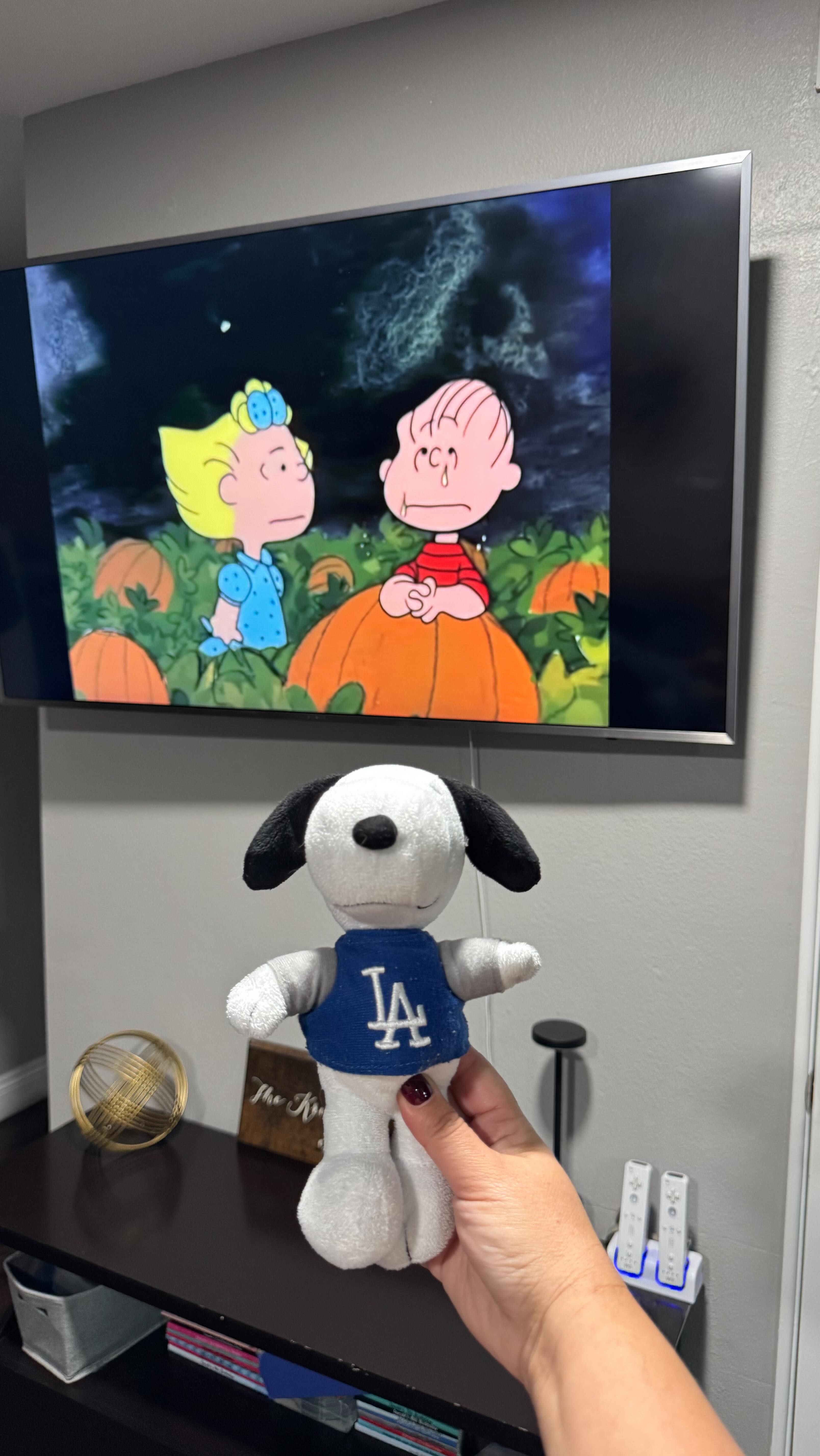 Instagram post by @mamachitchat for Snoopy and The Peanuts Gang. Caption reads: One of the sweetest traditions from my husband’s....
