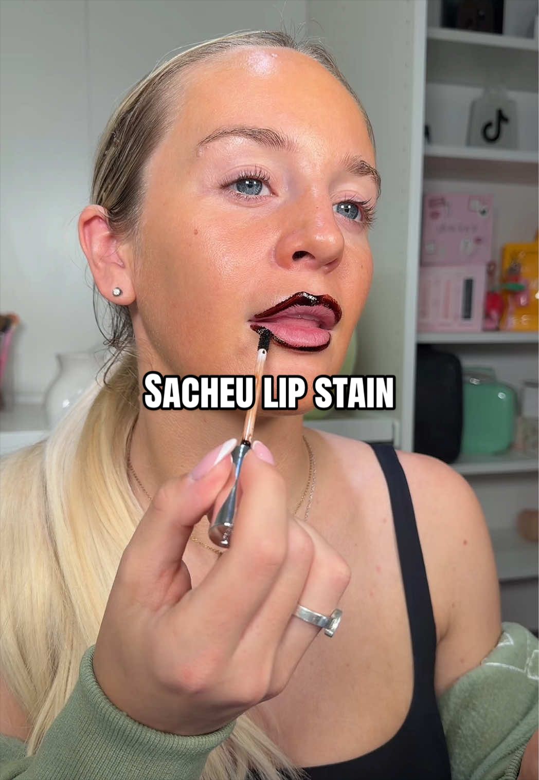 TikTok post by an influencer for Sacheu. Caption reads: lip stain always 🤏🏼🤏🏼 @SACHEU UK #sacheu....