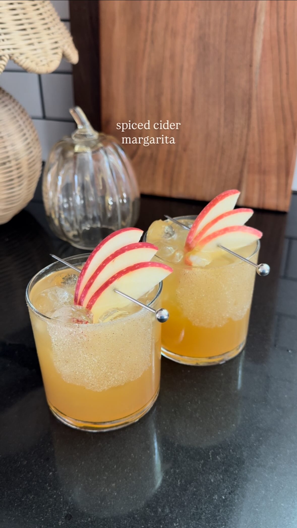 Instagram post by @ashleylaurentassano for Total Wine & More. Caption reads: Spiced cider margarita 🍎✨ This is the perfect....