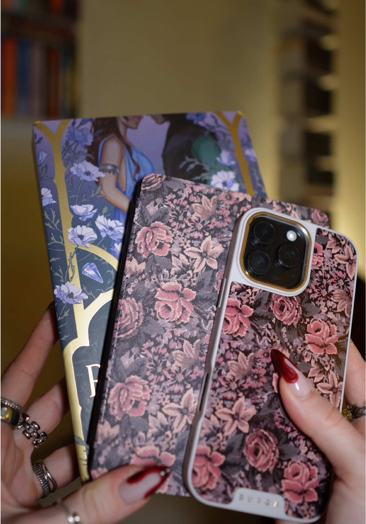 TikTok post by @mariannasreads for BURGA. Caption reads: [...] Day!! Can you tell I’m obsessed with @BURGA....