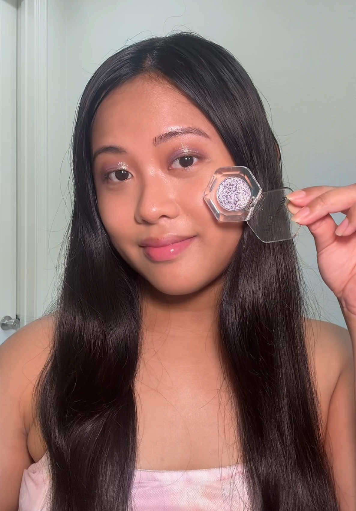 TikTok post by @msmlxo for Adriana Nichole Cosmetics. Caption reads: [...] this to the @BTS concert 💜 @Adriana Nichole....