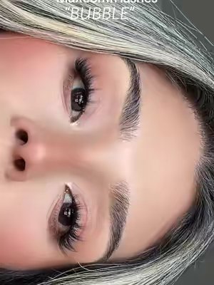 TikTok post by @ntania24 for Maxcomfi. Caption reads: @Maxcomfi #maxcomfi #clusterlashes #lashes [...].