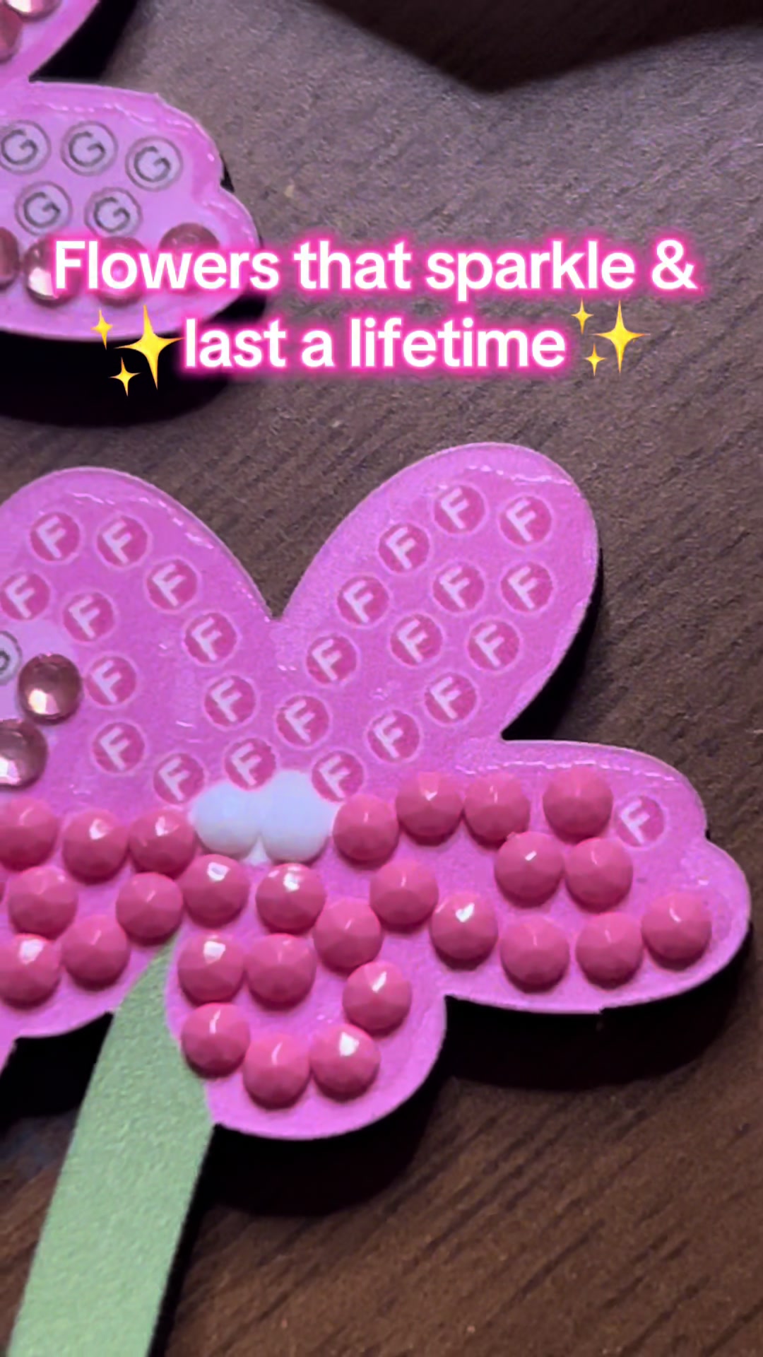 TikTok post by @pip_elderflower for Craft Buddy. Caption reads: [...] is the sparkle on those flowers! @Craft....