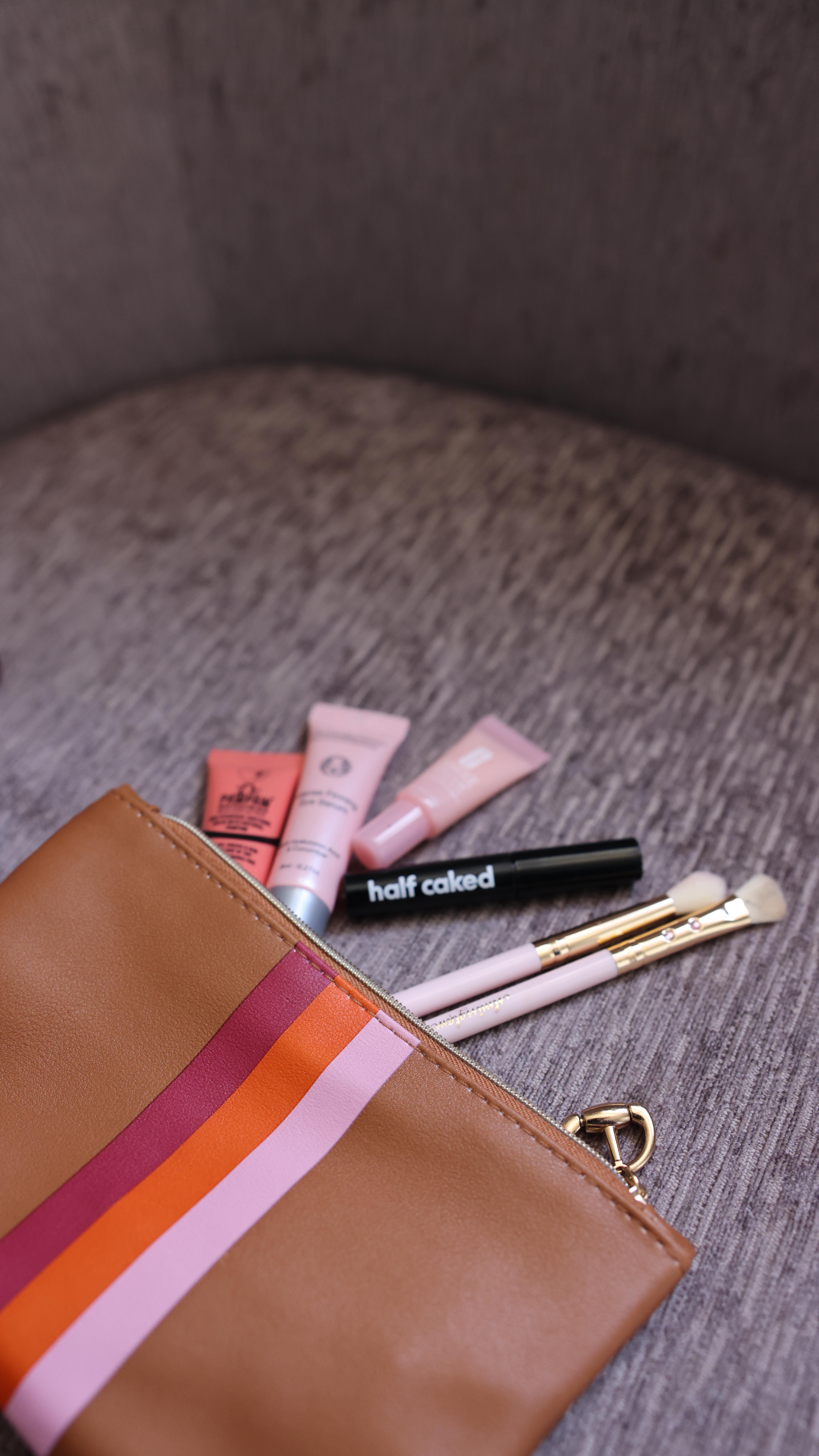 Instagram post by @tenickab for Frank Body. Caption reads: The @ipsy glam bag is the perfect accessory for....