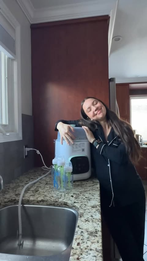 Instagram post by @variahaworth for Momcozy. Caption reads: Baby prep is in full swing!! 👶🏼🍼 
Not sure how....