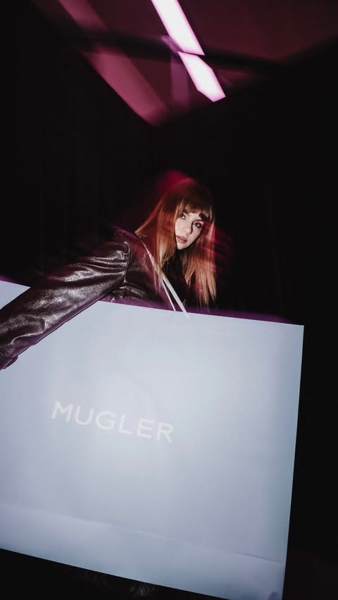 Instagram post by @kathi.vds for Mugler. Caption reads: Anzeige | 1. Spray @muglerofficial Alien Pulp 2.....