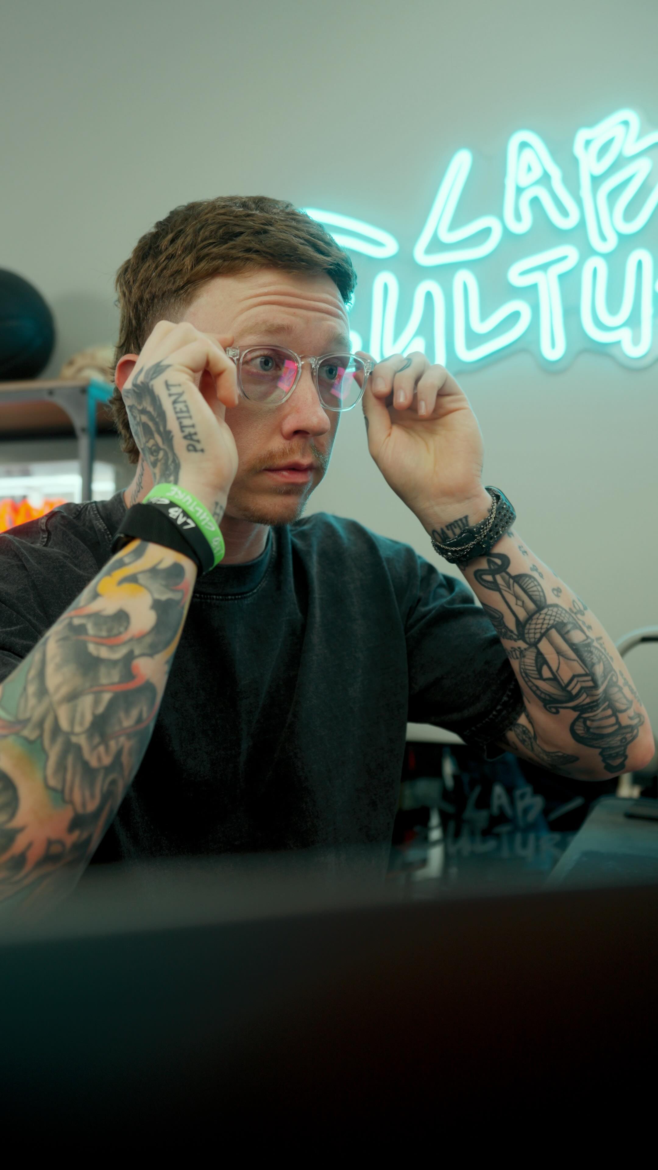 Instagram post by @johnnyhochstetler for Zenni. Caption reads: The essentials that keep me dialed....