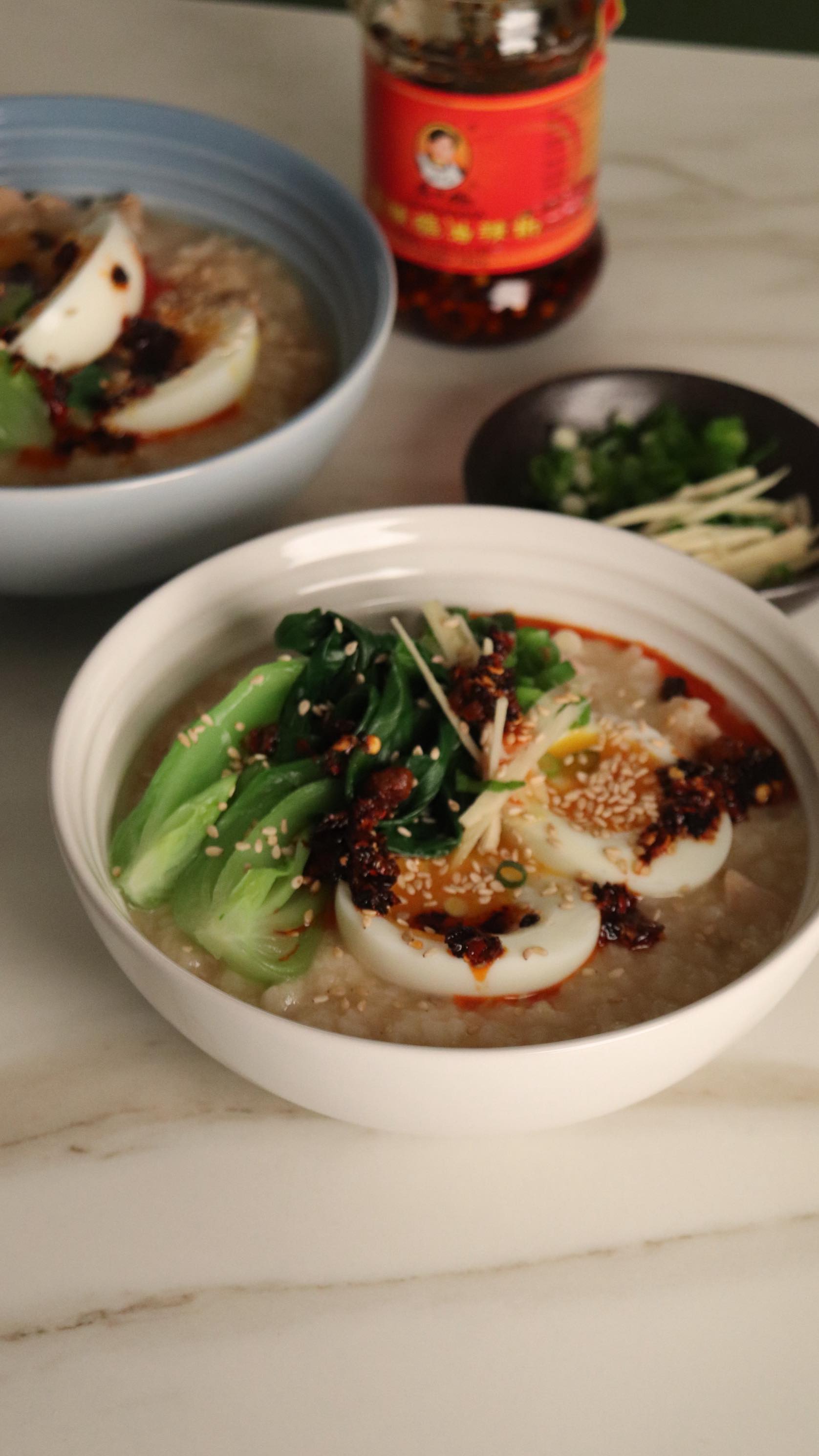 Instagram post by @stayforlunch for Woolworths. Caption reads: Cozying up dinner this winter with chicken congee,....