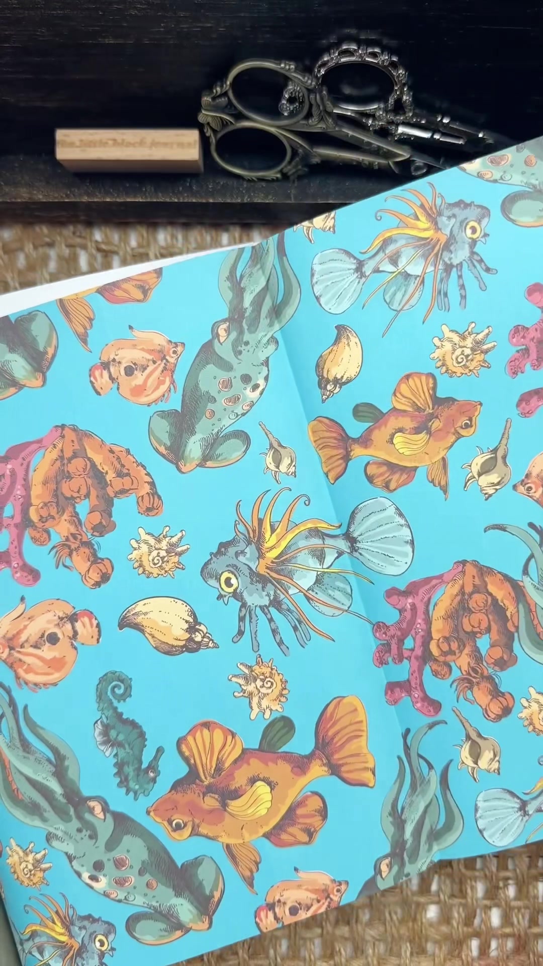 TikTok post by @the.little.black.journal for Grabie Art. Caption reads: [...] Ocean Odyssey 🐠🐚⚓️ Collage Book from....