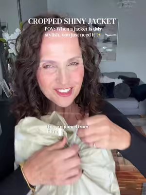 TikTok post by @susielou70 for PUFFIT UK Shop. Caption reads: I’m loving this cropped jacket, it’s super trendy....