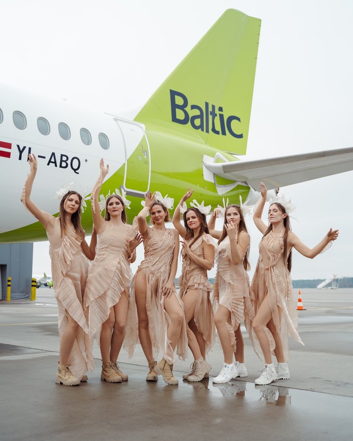 Instagram post by @tautumeitas for airBaltic. Caption reads: The behind-the-scenes nobody asked for, but....