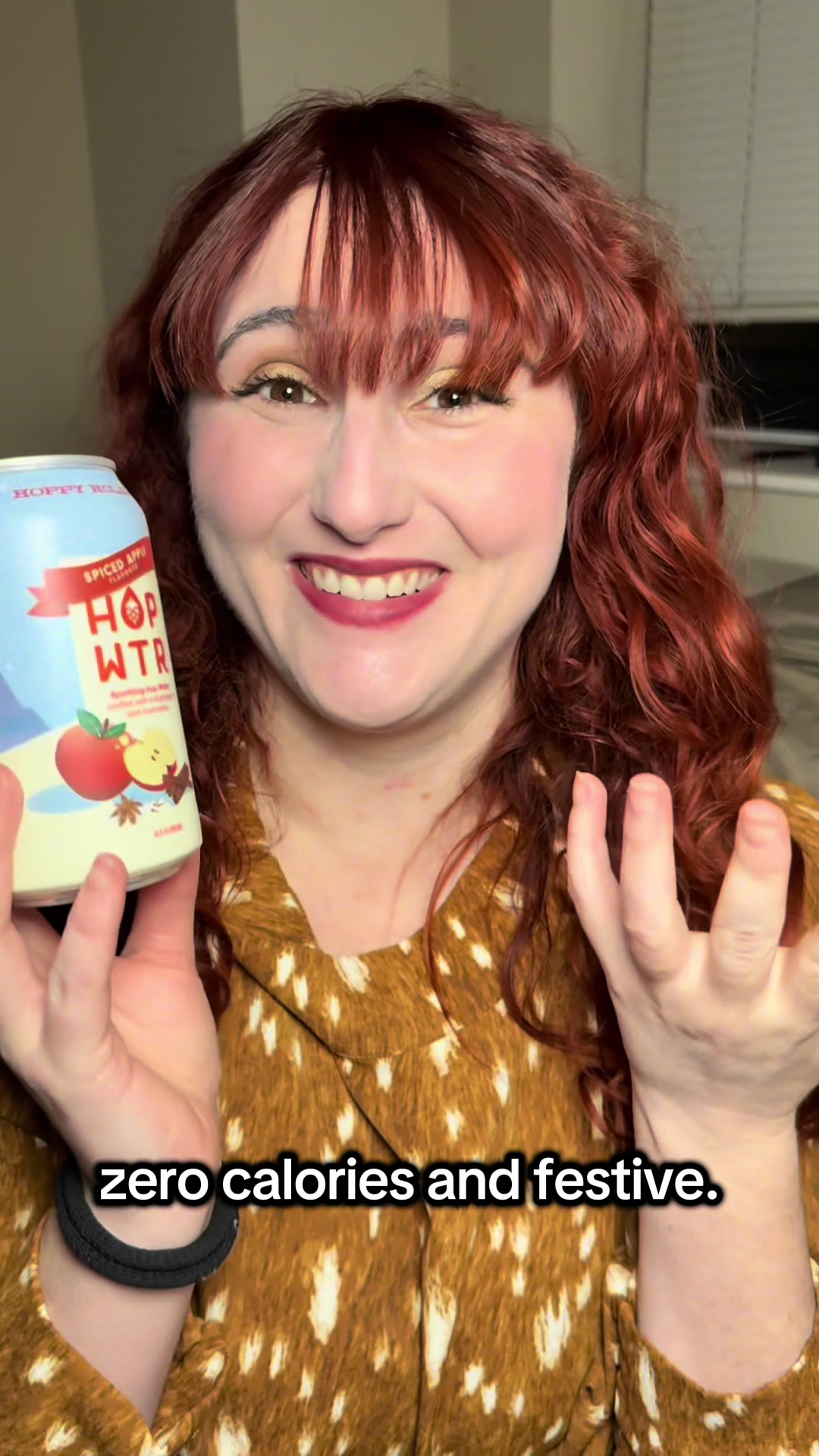 TikTok post by @candijessie for Hopwtr. Caption reads: Wohooo a fun seasonal bubble water spiced apple....