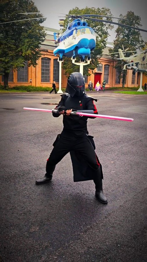 Instagram post by @mandoh_with_a_cam for KenJo Sabers. Caption reads: [...] 𝐋𝐢𝐠𝐡𝐭𝐬𝐚𝐛𝐞𝐫 𝐬𝐭𝐚𝐟𝐟 ⚔️🗡️....