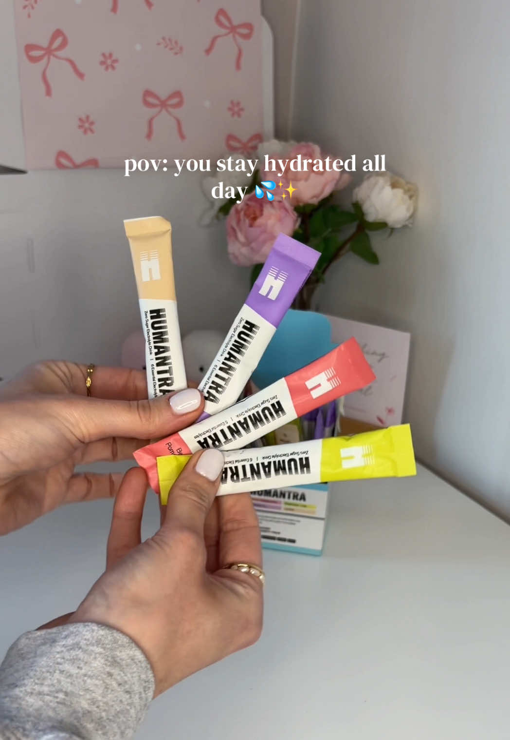 TikTok post by @anna.stockwell for Humantra. Caption reads: [...] the best flavours… I’m obsessed 🩵✨....