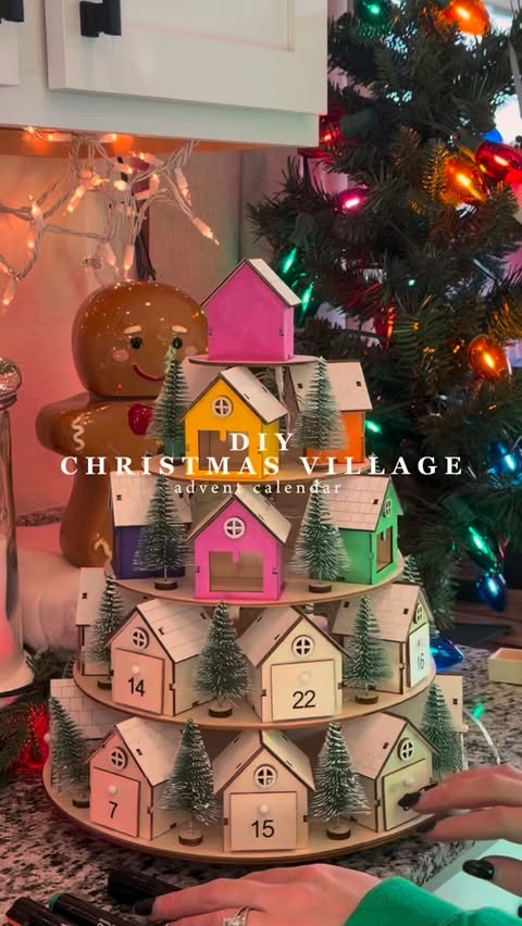 Instagram post by @amyyylit for Hobby Lobby. Caption reads: Had to snag Hobby Lobby’s DIY Advent calendar when....