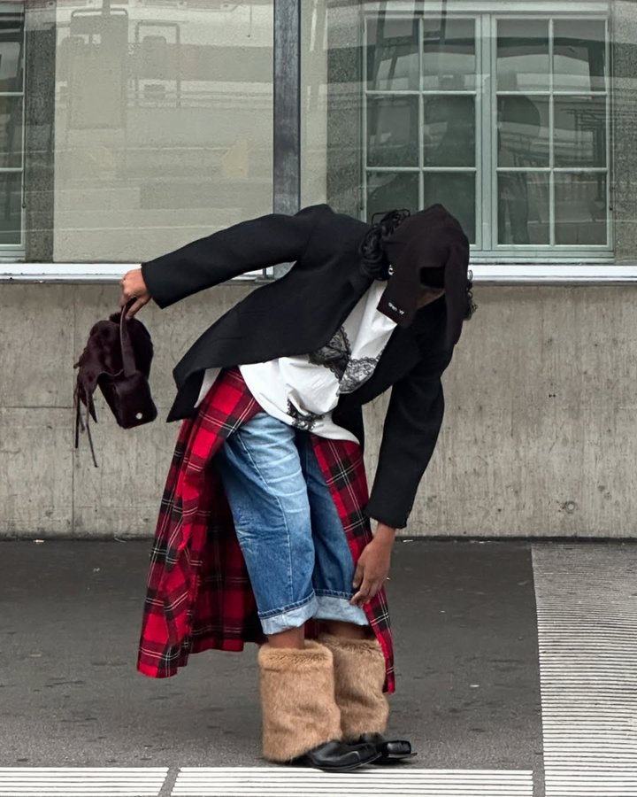 Instagram post by @by.regiina for SSENSE. Caption reads: Layers and layers and layers @ssense
 #ad.