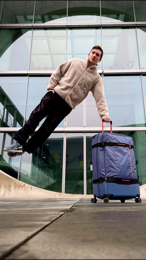 Instagram post by @flippingnate for American Tourister. Caption reads: [...] ❤️ 

I got a new travelbuddy from....