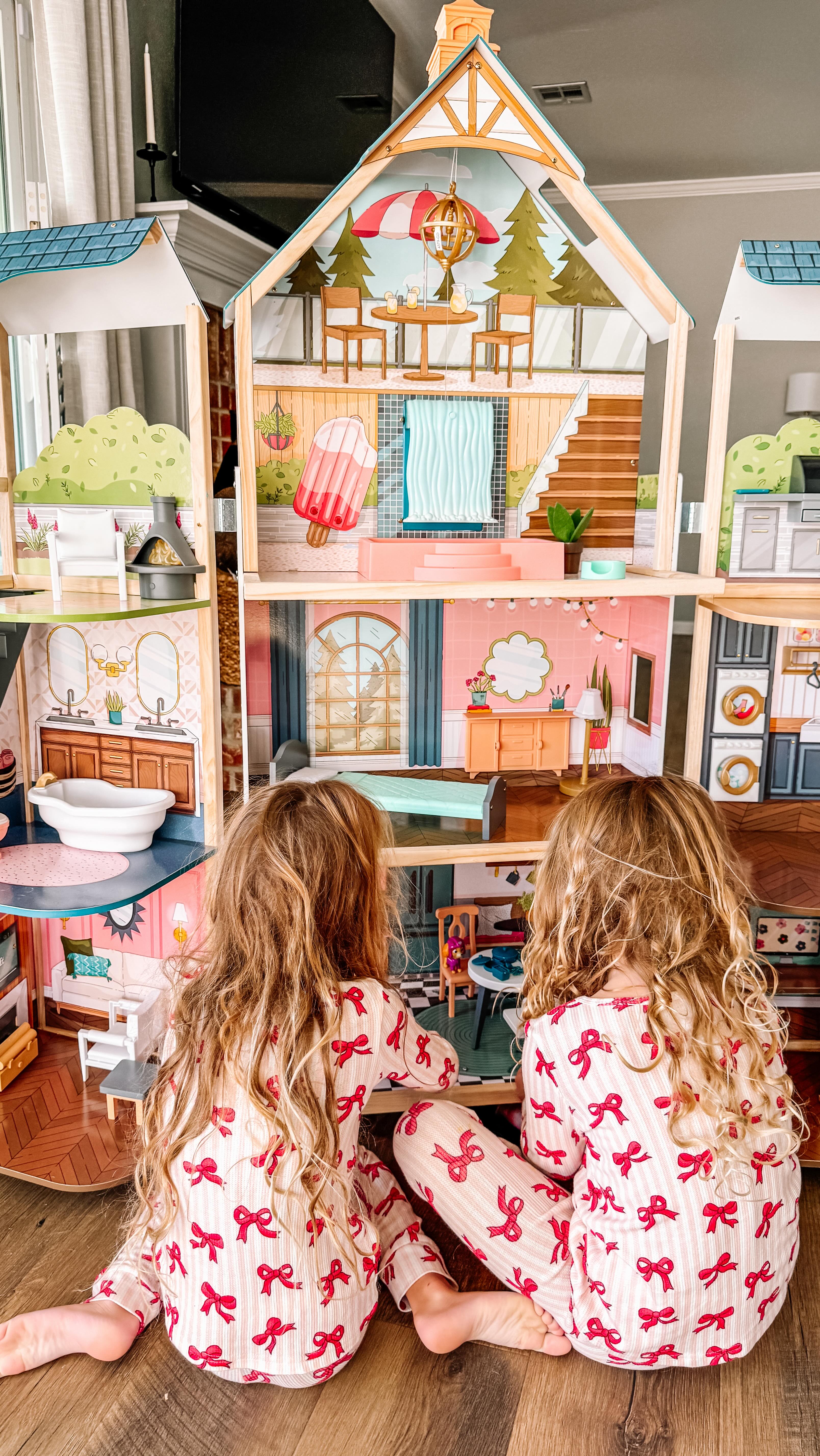 Instagram post by @doubleshotofbabies for KidKraft. Caption reads: [...] little someone who loves dolls....