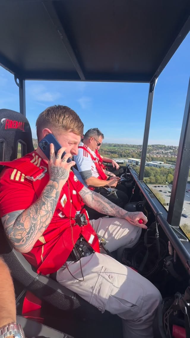 Instagram post by @tomnestorcomic for Fireball Whisky. Caption reads: Front row? Nah. @FireballUK had me 50m above the....