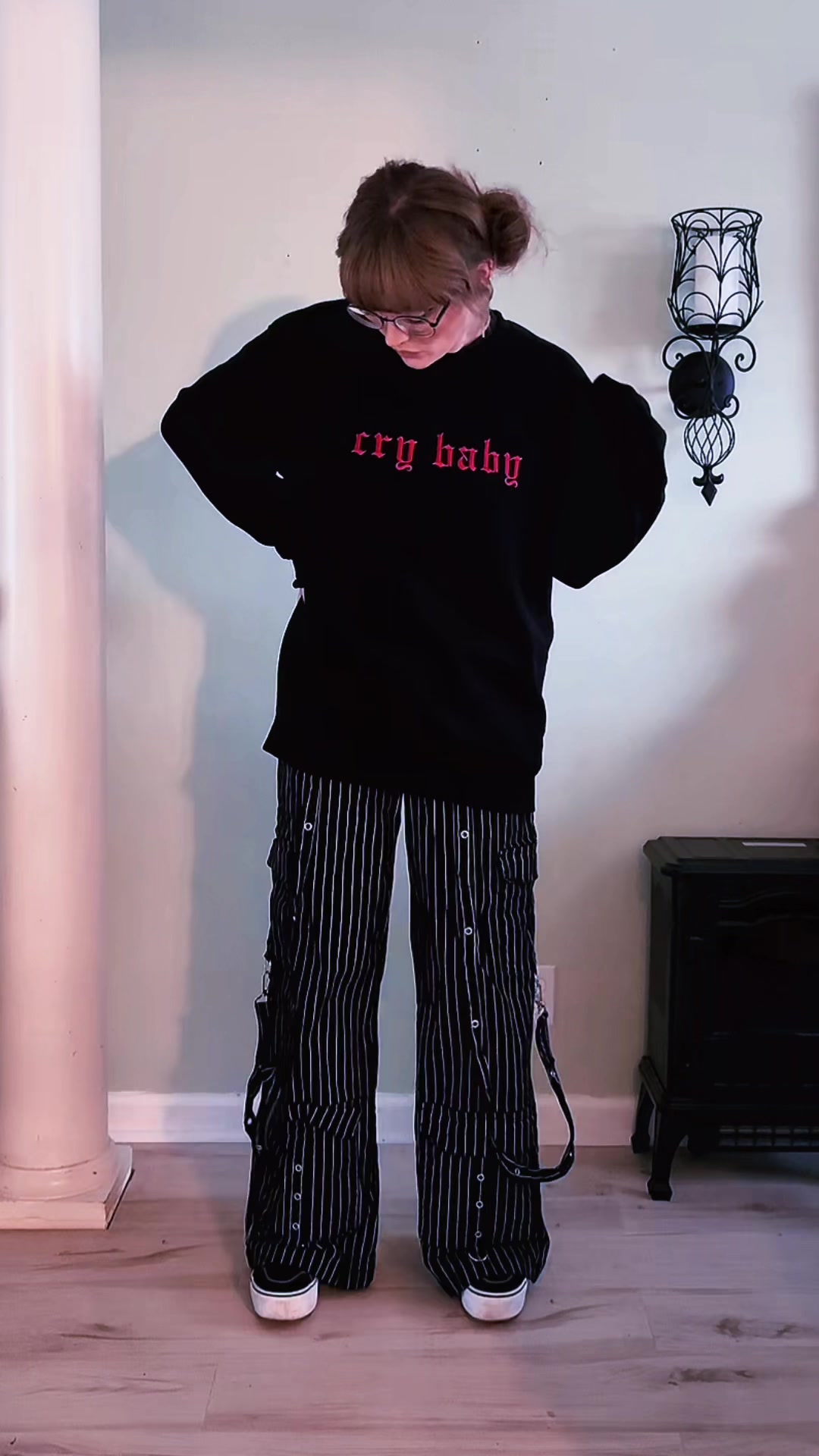 TikTok post by @ashlogue7 for In Stitches Apparel. Caption reads: @In Stitches Apparel #crybaby #crashout #alt [...].
