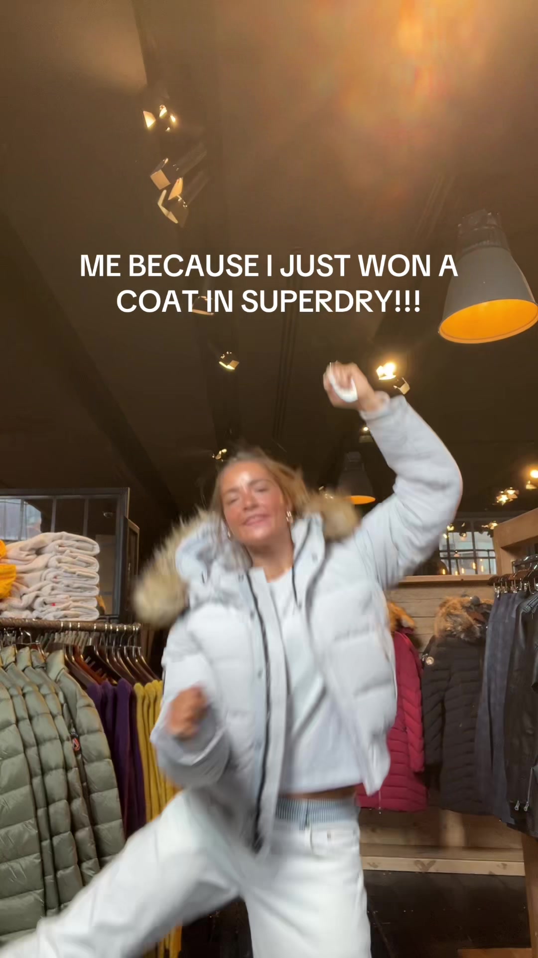 TikTok post by @et4lie for Superdry. Caption reads: and you can too! come and spin the wheel on oxford....