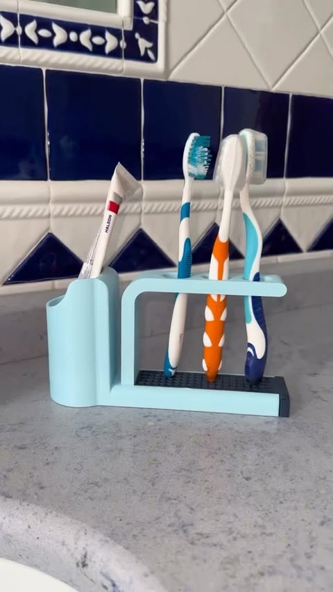 Instagram post by @3d_printall for ELEGOO. Caption reads: Toothbrush holder printed on @elegoo Centauri....