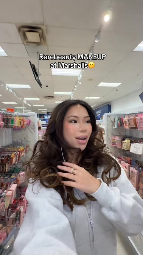 Instagram post by @christxiee for Marshalls. Caption reads: Rarebeauty is at @marshalls ?? We must investigate.