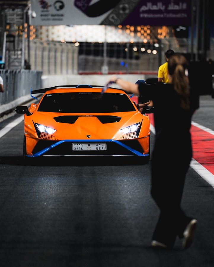 Instagram post by @a7mdjam for Lamborghini. Caption reads: [...] #Huracán ##STO Photographed for....