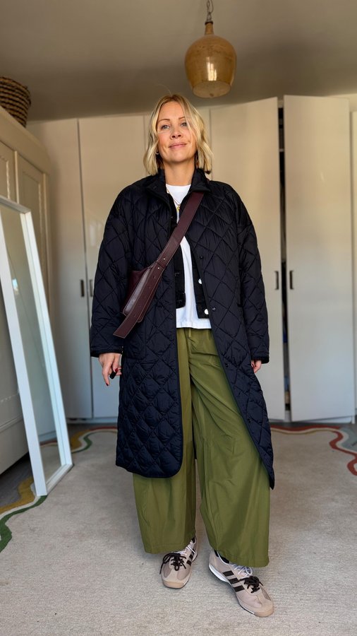 Instagram post by @ashley.dainty for WEEKDAY. Caption reads: Autumn outfit 🍂 layering.. 
🫒 these trousers....