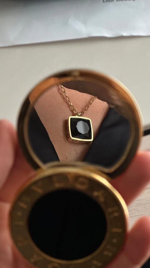 Instagram post by @cristinasurdu for COEUR DE LION Jewellery. Caption reads: 1 or 2 for the dinner with my parents-in-law? Help....