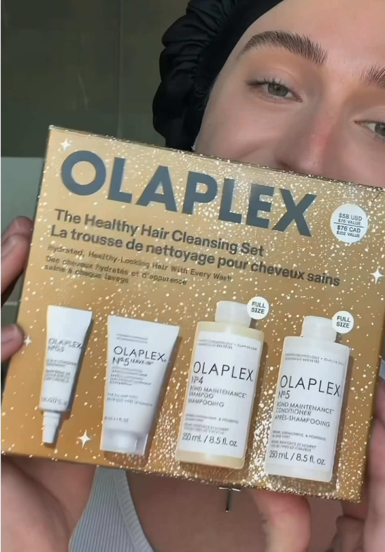 TikTok post by an influencer for OLAPLEX. Caption reads: [...] never goes out of season! #olaplexpartner....