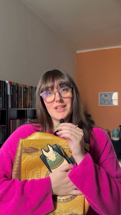 Instagram post by @nycbookhoe for loungefly. Caption reads: [...] I open this backpack now #themummy....