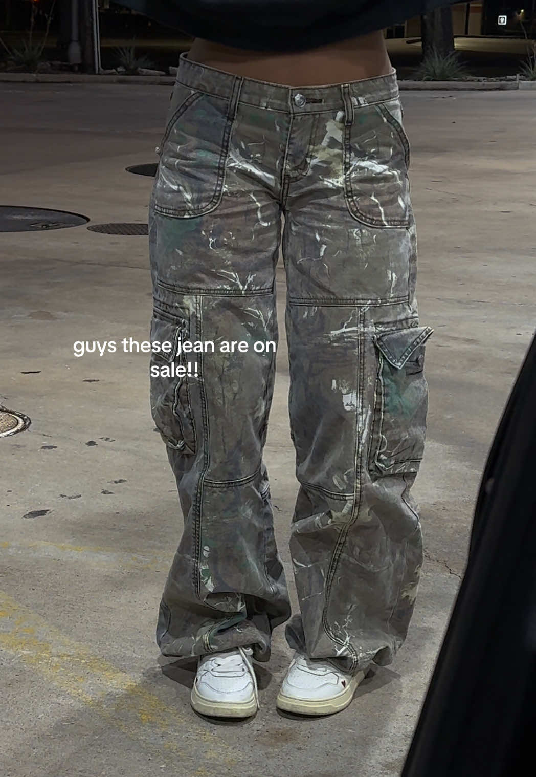 TikTok post by @nothanksimhungry for Revice Denim. Caption reads: my favorite camo jeans are on sale now!....