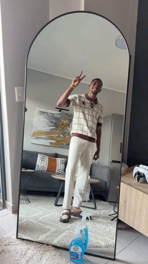 Instagram post by @katlegopilane_ for Handy Andy South Africa. Caption reads: Bad day? A few sprays of Handy Andy Glass &....