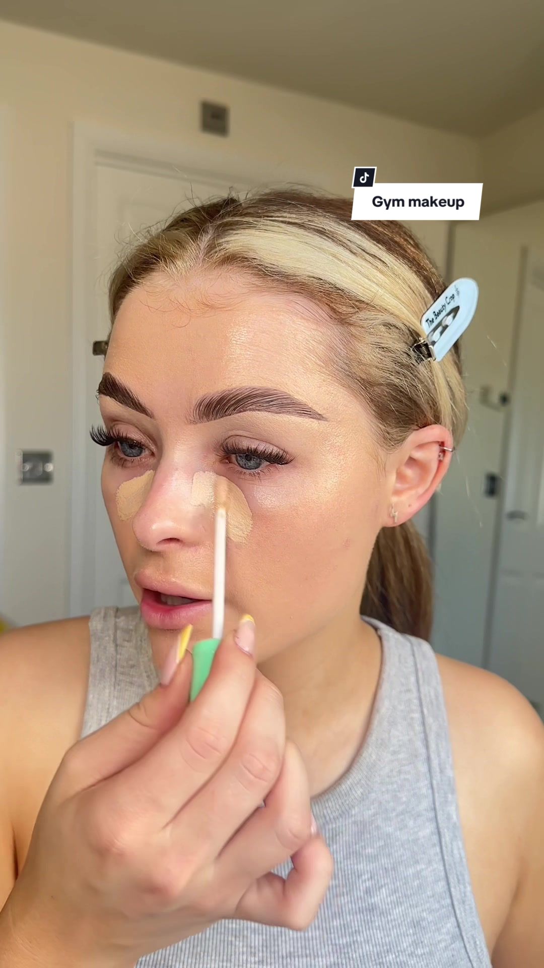 TikTok post by @byeleanorwood for The Beauty Crop. Caption reads: Replying to @becky-xo-360 glowy lightweight makeup....