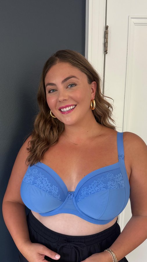 Instagram post by @caralynmirand for Elomi Lingerie. Caption reads: No one tells you this… 👀👙 but one bra isn’t....