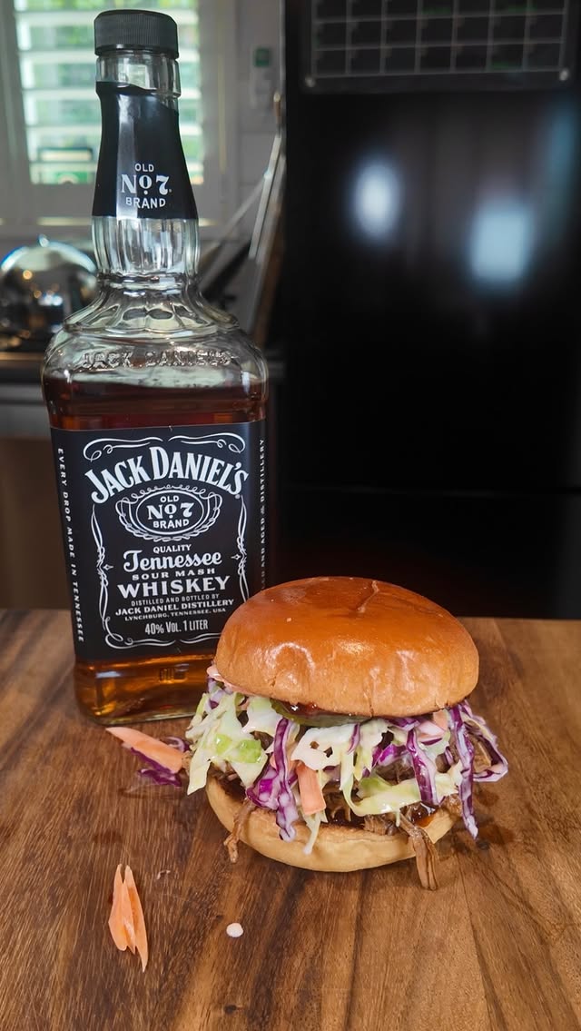 Instagram post by @tom.smallwood for Jack Daniel's. Caption reads: [...] Ultimate pulled pork with a little....