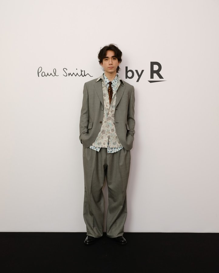Instagram post by @kazumamitchell for Rakuten Fashion. Caption reads: Paul Smithが「by R」支援のもと、「Rakuten Fashion Week....