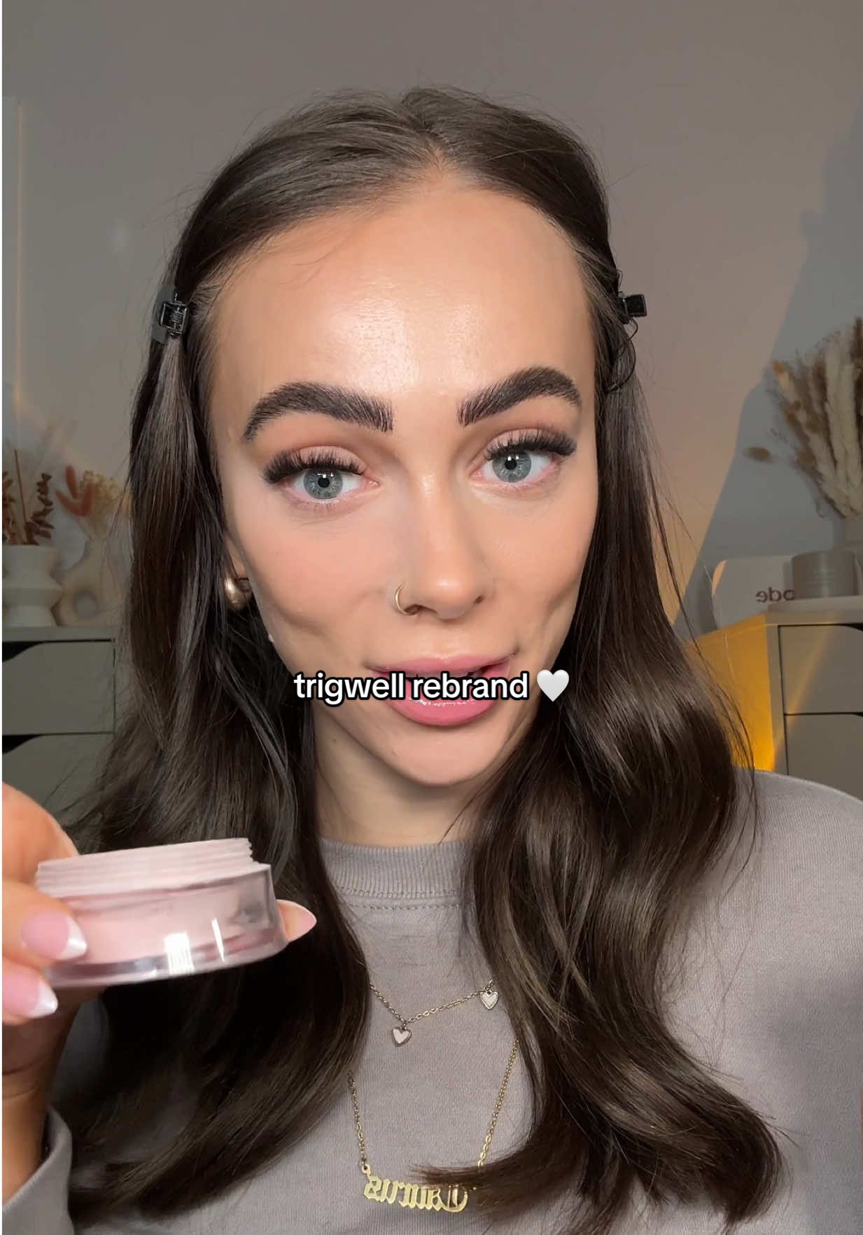 TikTok post by @amynicolemakeup for Trigwell Cosmetics. Caption reads: darlings.. trigwell are rebranding 🤭 such a shame....