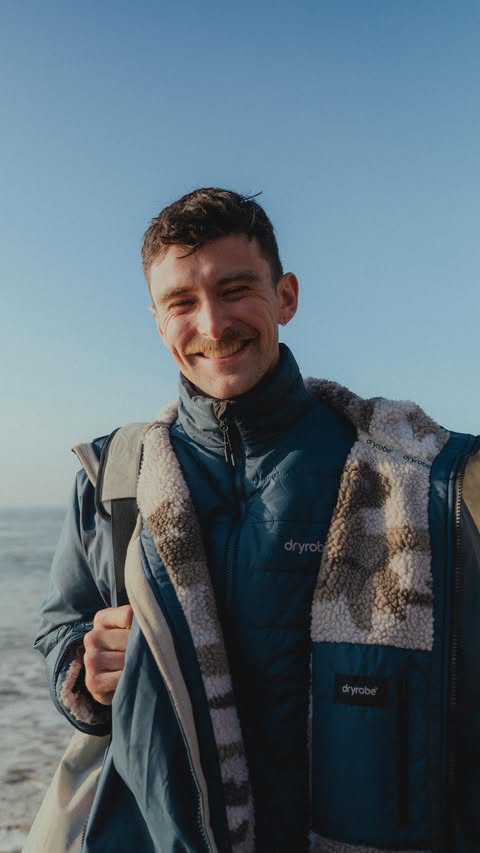 Instagram post by @tadhg_obrien for dryrobe. Caption reads: The start of the summer adventures ☘️ w/ @dryrobe....